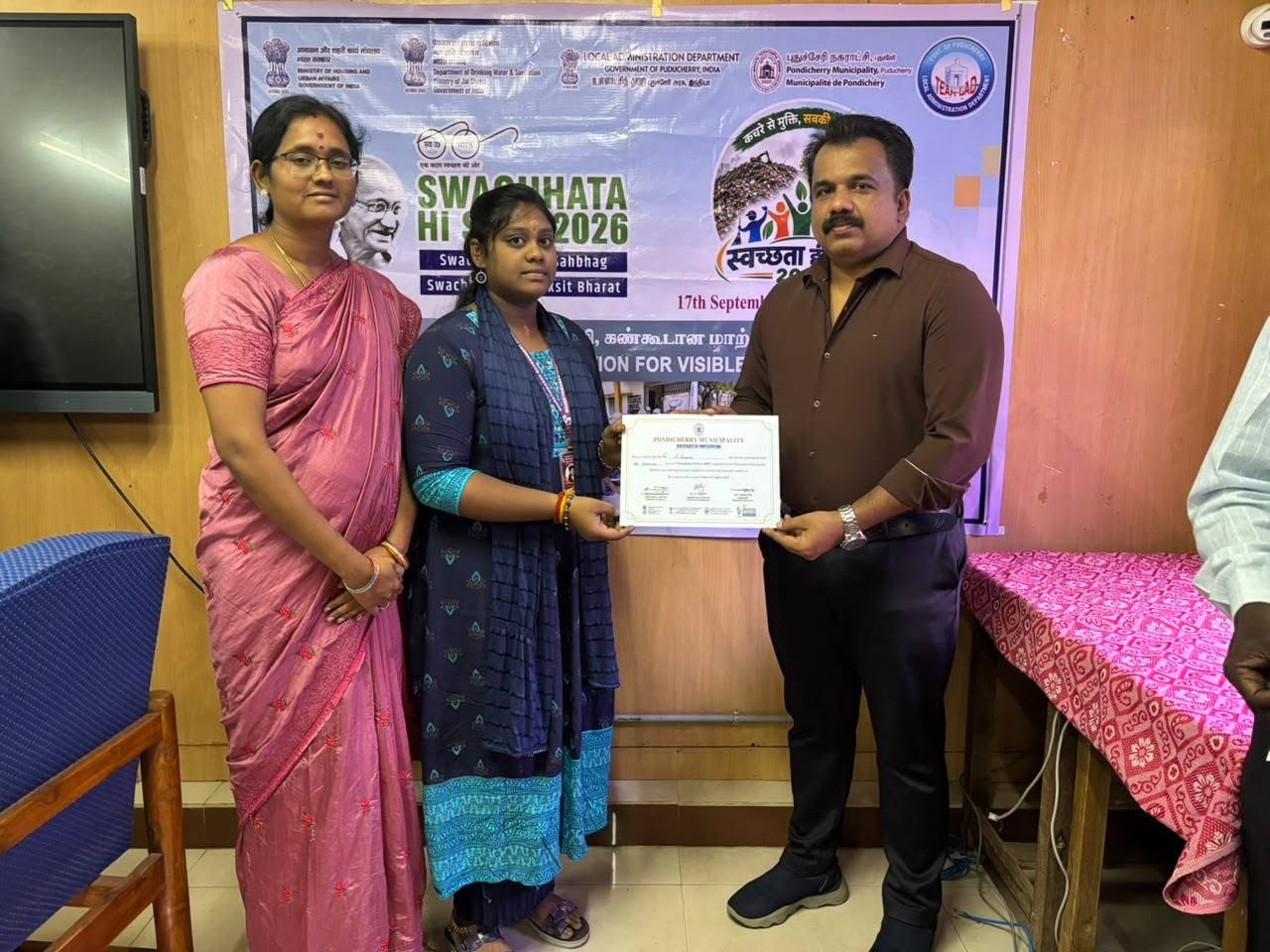 Swachhatha Hi Seva 2026 - Distributing Certificate to Art Competition Participants