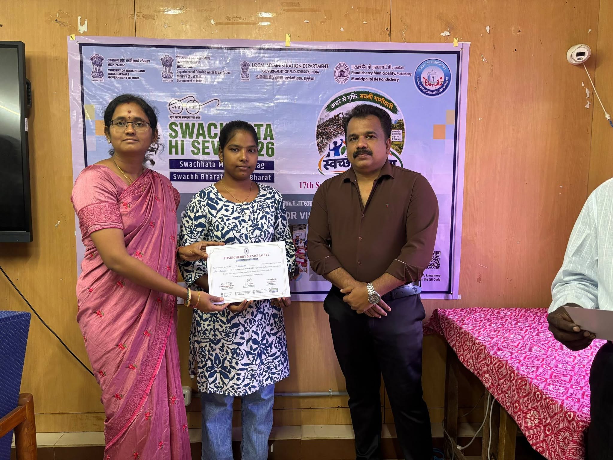 Swachhatha Hi Seva 2026 - Distributing Certificate to Art Competition Participants